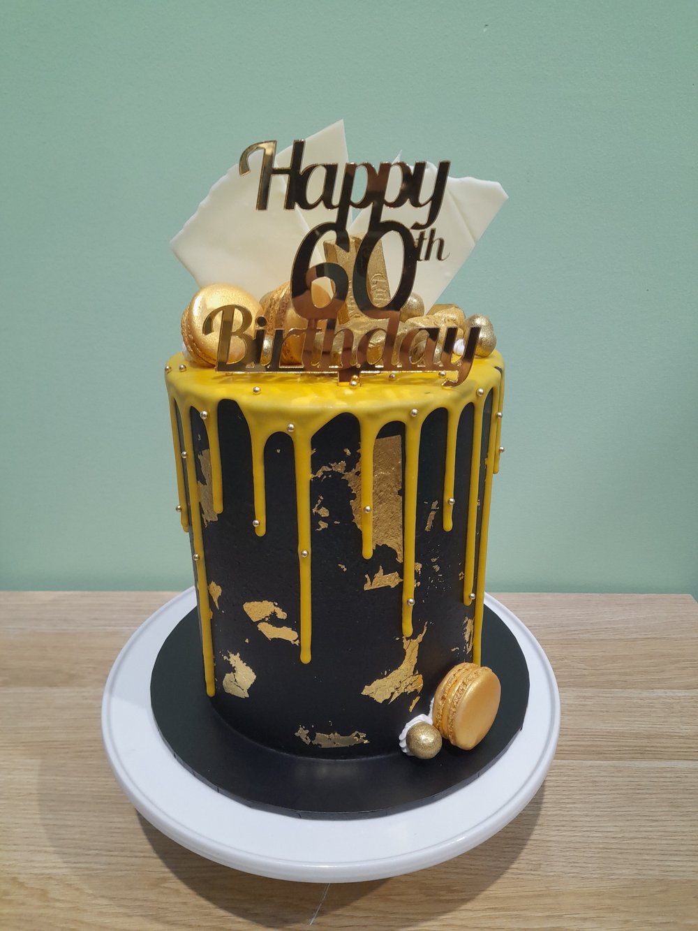 Tall Drip Cake With Chocolates — Stylish Cakes Co.