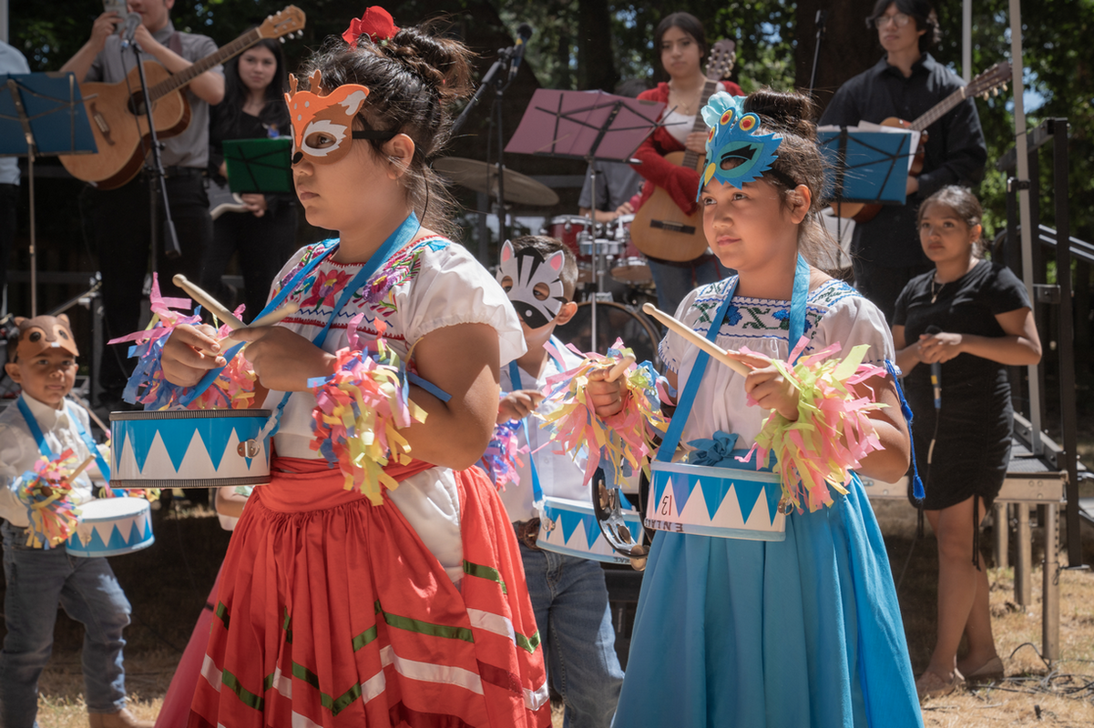 ENLACE drum parade by children 2 lr.png