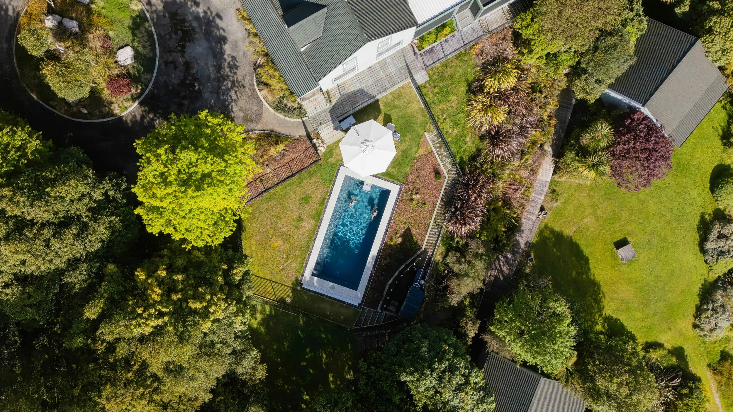 Maruia River Retreat-AerialPool.jpeg