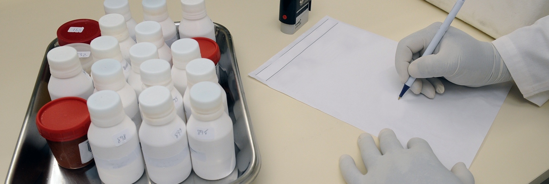 Canva+-+Person+in+White+Hand+Gloves+Writing+on+White+Paper.jpg