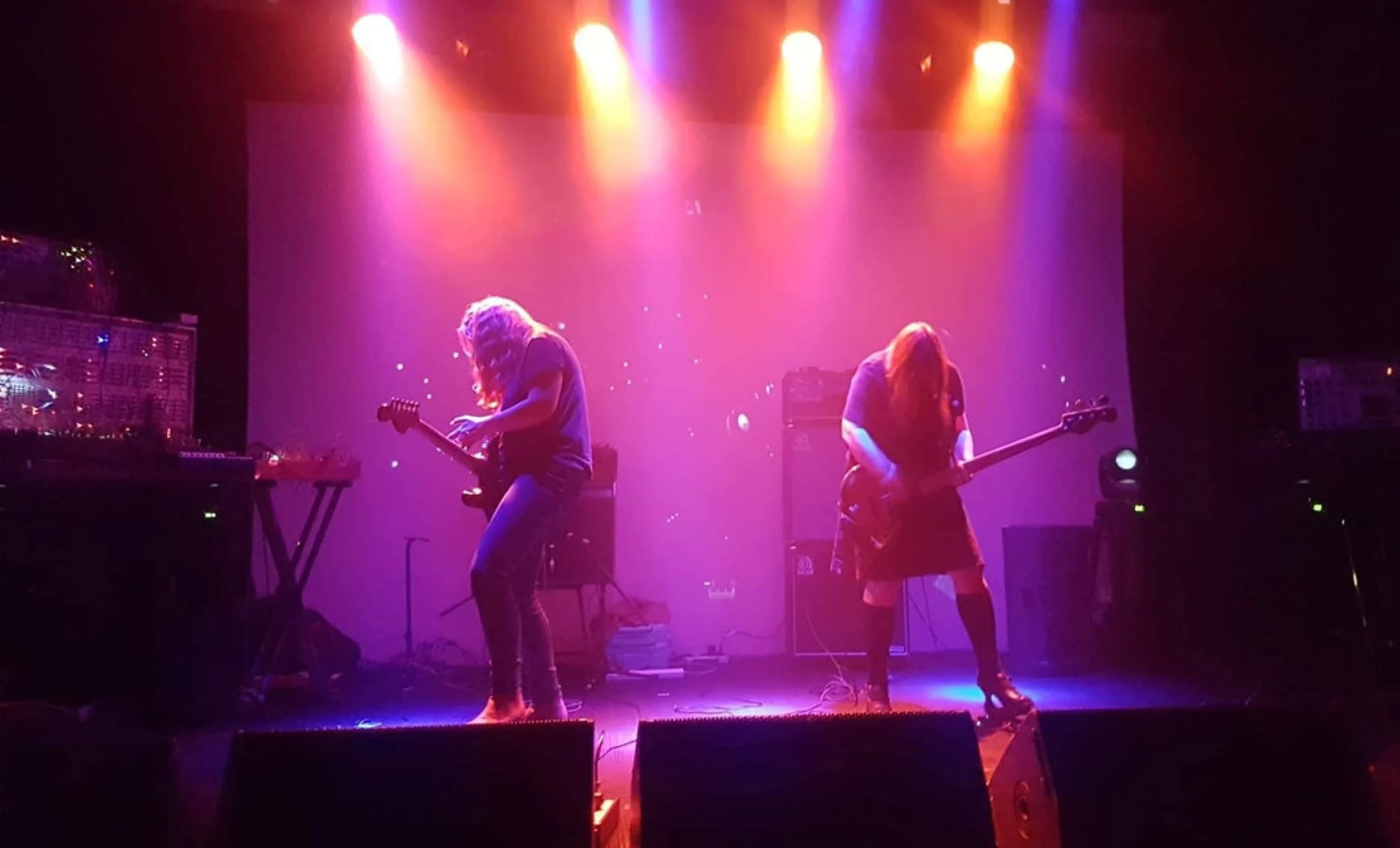 Lisa MacKinney (guitar) and Cat Hope (bass) are Super Luminum. Photo by Evgeny Posnikov.