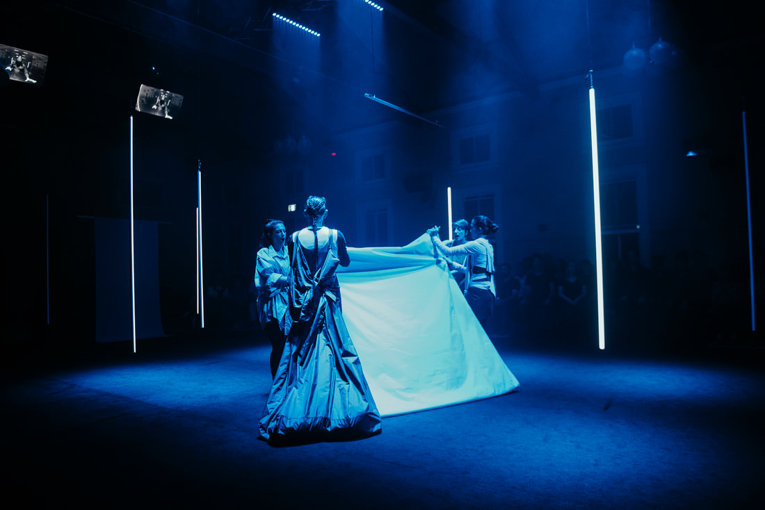  The formal flag folding sequence in Act II. Image by Rachel Barrett. 