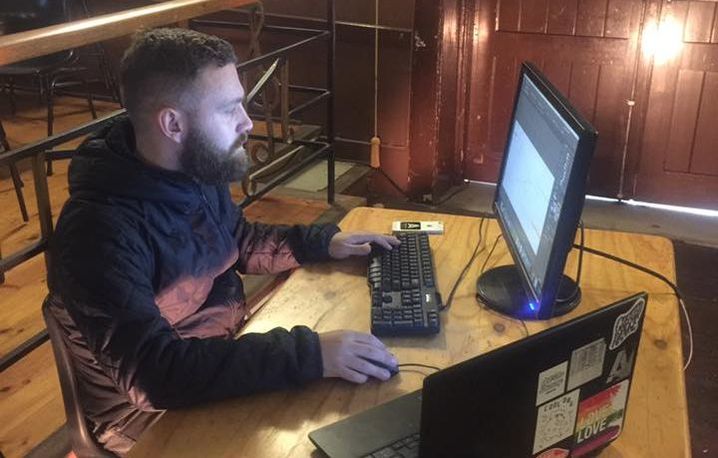 Copyist AKA score maestro Dan Thorpe updating annotations on to the score.