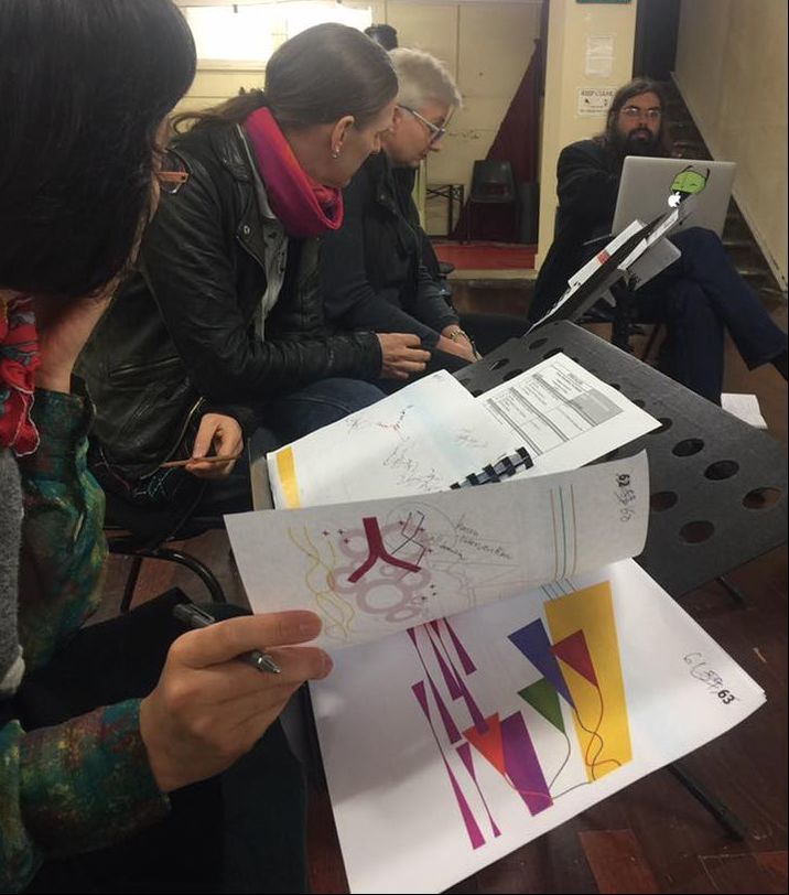 Vocalists Alice, Sage, Judith and music director Aaron rehearsing.