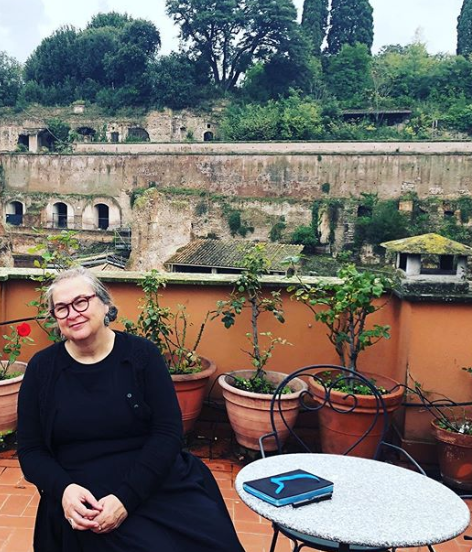 On the balcony of Scesli's home