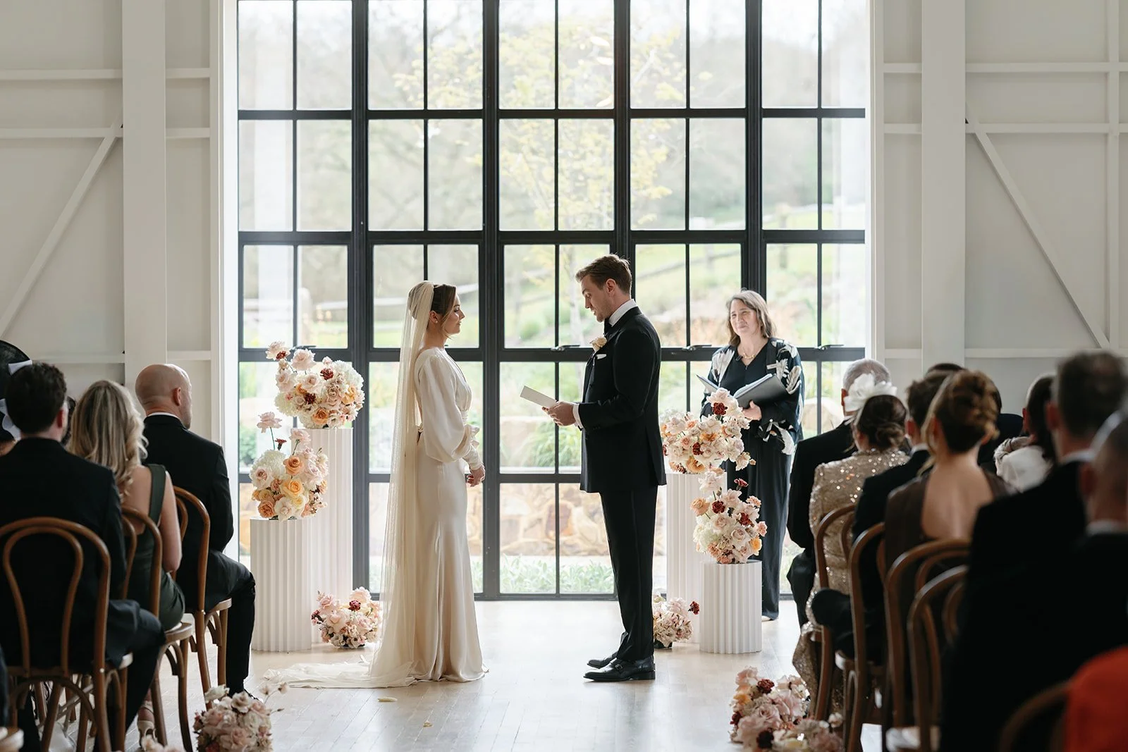 limekiln wedding captured by Laura Vieceliphotography aisle florals cotswold wedding Two Little Birds