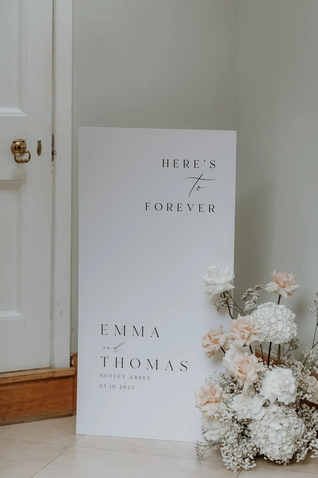 NotleyAbbey wedding buckinghamshire wedding white reflexed roses captured by Joanna Ranson Photography welcome sign wedding Two Little Birds