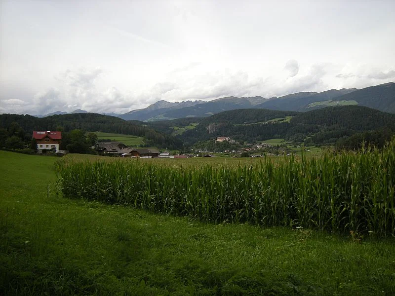 The valleys contain some larger towns and villages, roads and railways, as well as countless farms that benefit from fertile soil and a mild climate.