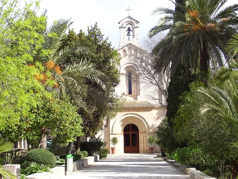 This small church has a beautiful garden with palms, fruit, ornamental trees, perennials, and herbs.