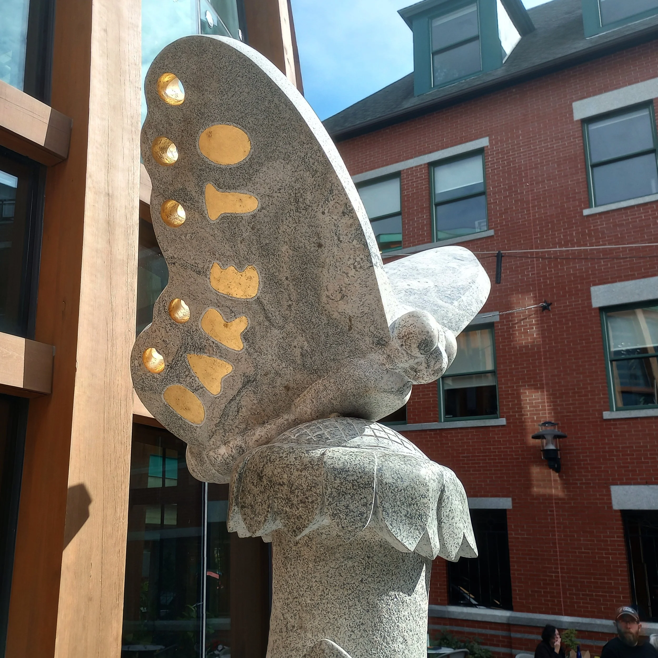  Gold-leaved perforations carry light to the underside of the wings, where patches of gold reveal the words ‘Dare to Change’   