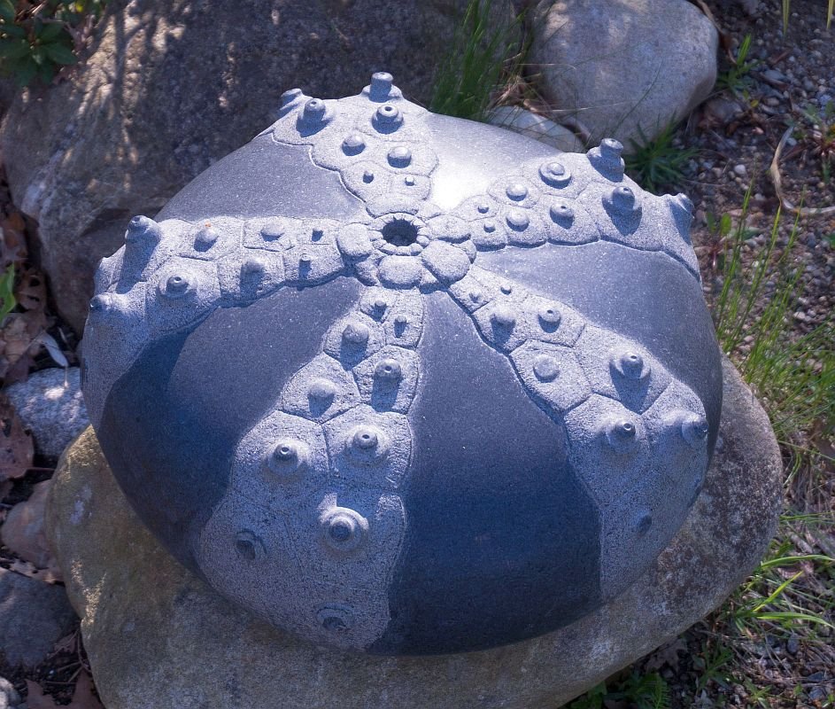 'Cidaris' 2011, black granite, color contrast is a result of polishing versus chiseling