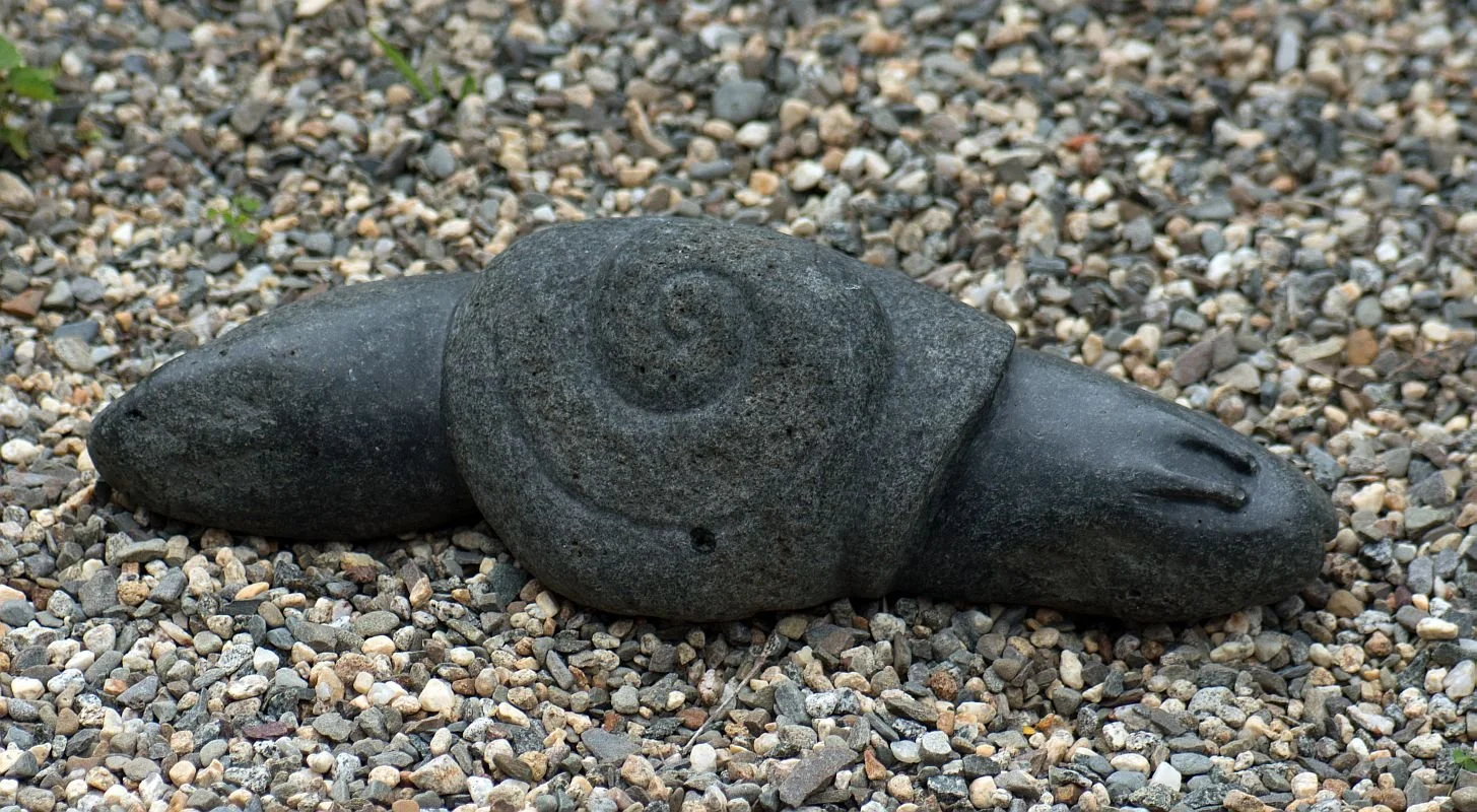 'Long Black Snail' 2008, fieldstone