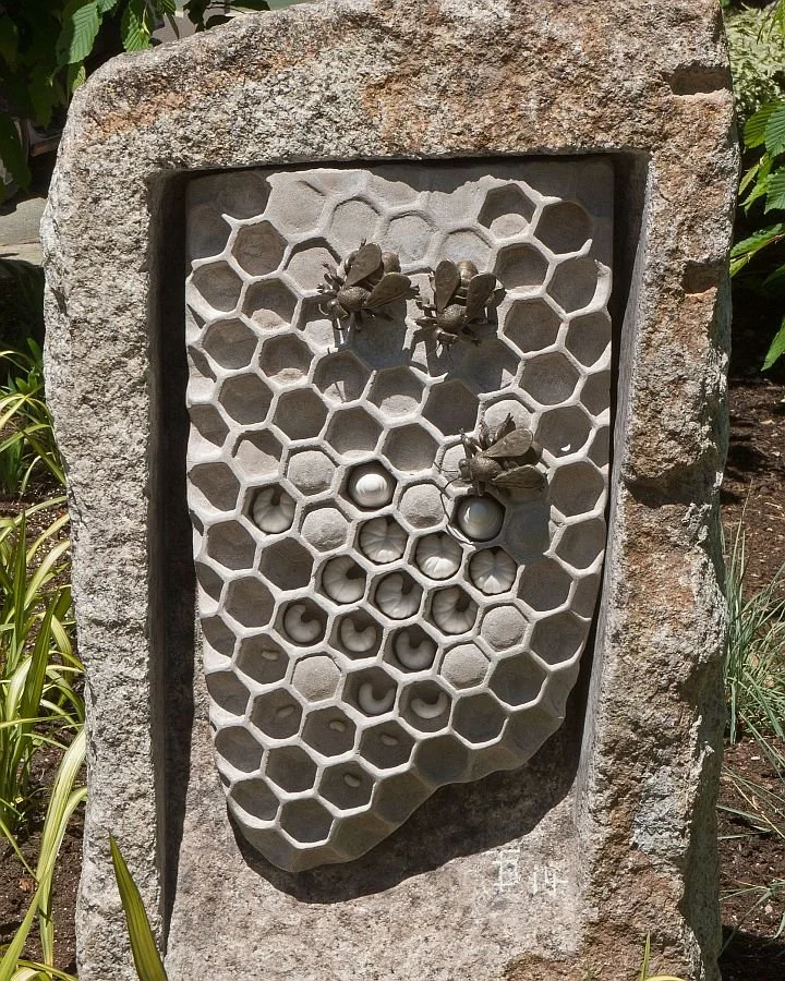 'Life in the Hive' 2013, granite, limestone, marble and bronze