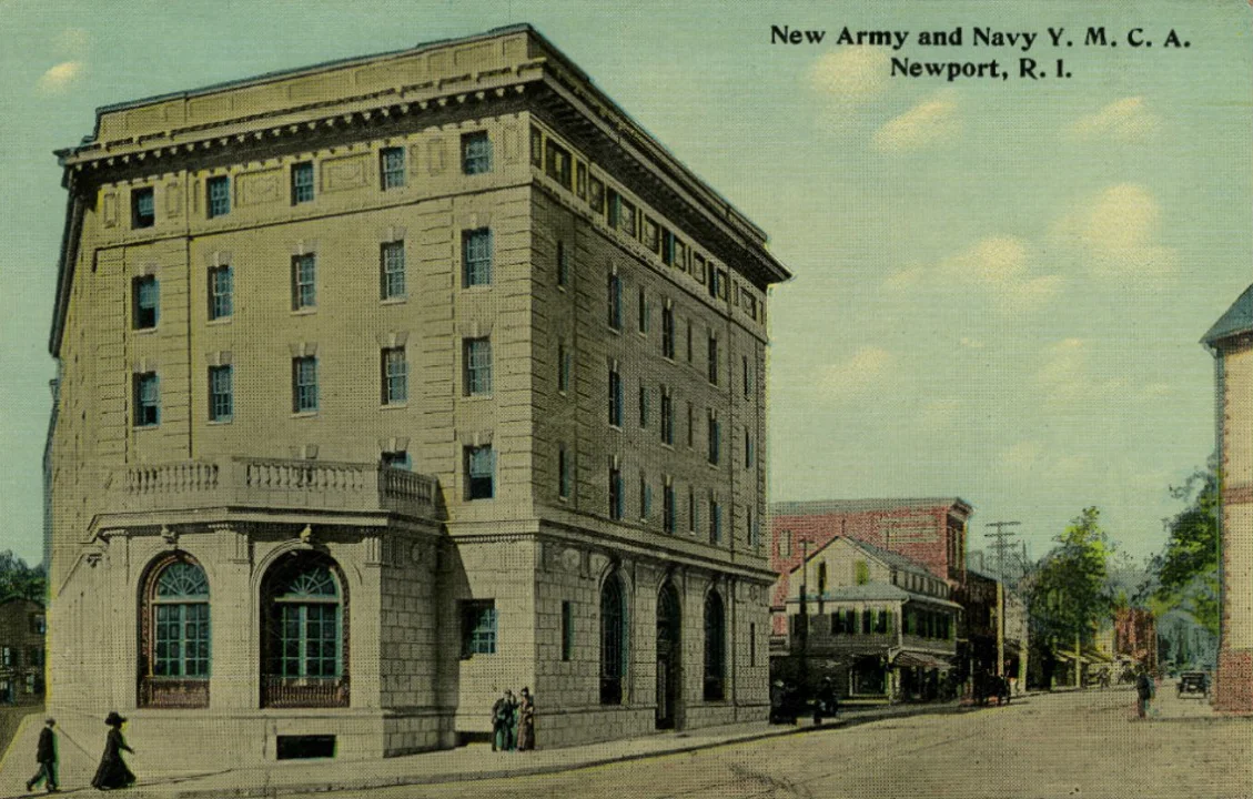 North up Broadway. Mino “At the bottom of Broadway, at a corner of Washington Square, and across the street from the Old Colony House, there stood a store I visited daily. It sold newspapers, magazines, picture postcards, maps for tourists, toys for children, and even Butterick Patterns. You can see the Materas store directly beyond the Army & Navy YMCA. The Materas were Italians who lived above the store. This was a store until the 1980’s.