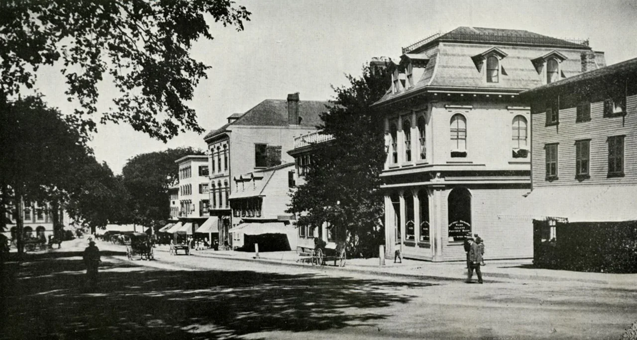 An older view looking west down Washington Square (c. 1880’s) from the foot of the Colony House. Although some of the buildings would have been there in 1919 when Theophilus was in Newport, much had changed by 1926 in this largely business area.