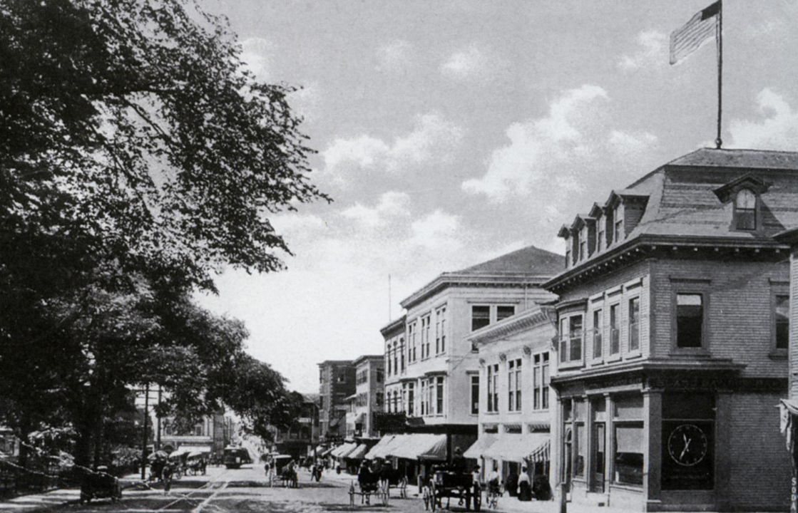 Another view looking west down Washington Square (c. early 1900). The buildings have changed and the street car is now seen in the picture.
