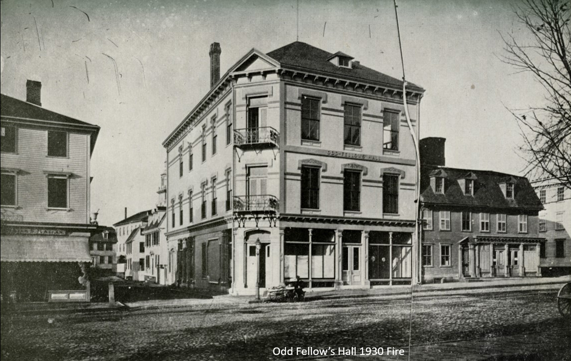  This view on Washington Square, looking north shows the old Odd Fellow’s Hall which stood until 1930. To the left on the other side of Charles Street, is a 3-story store which, in 1925, would be torn down to make way for a bank. Theophilus would hav