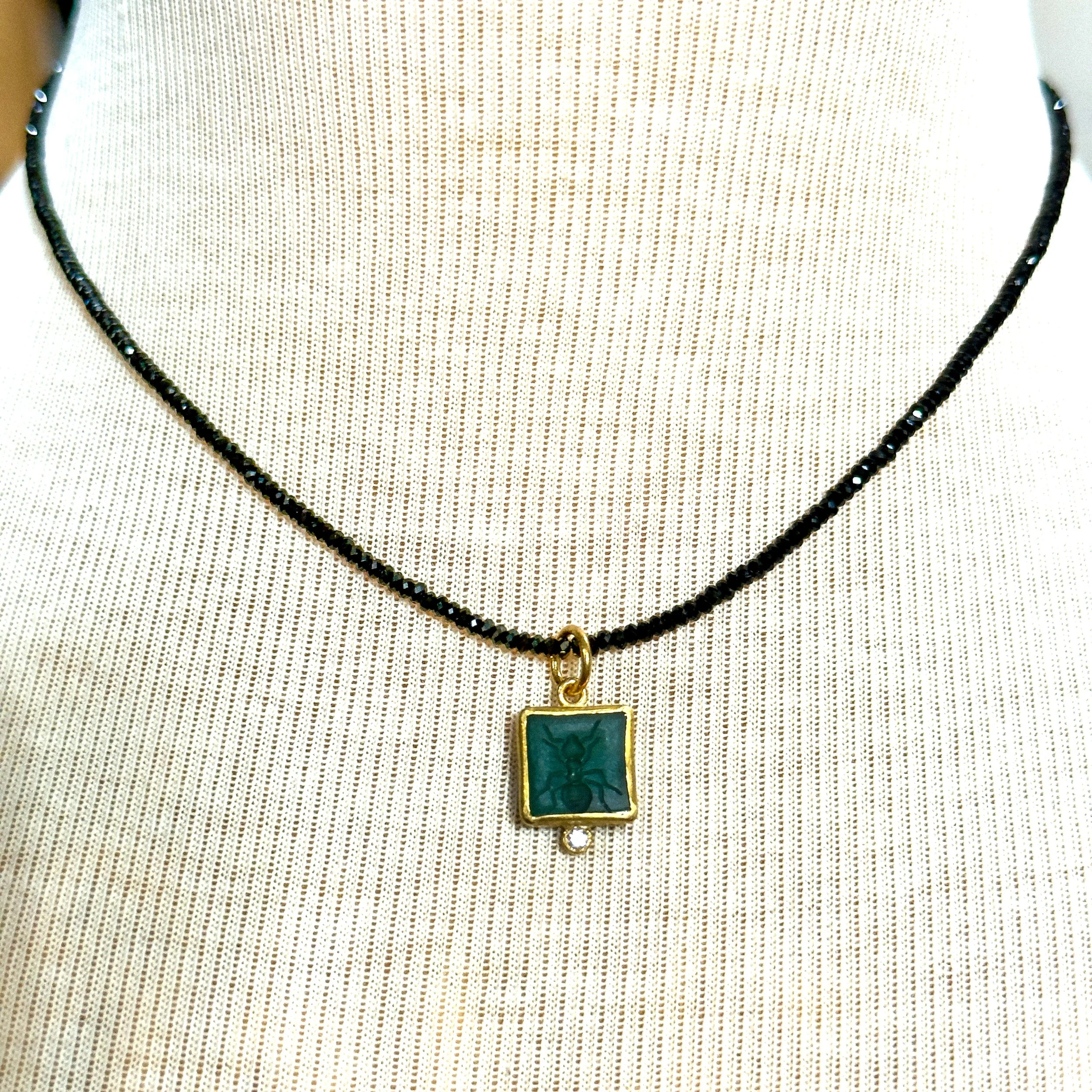 ant pendant on spinel.jpg