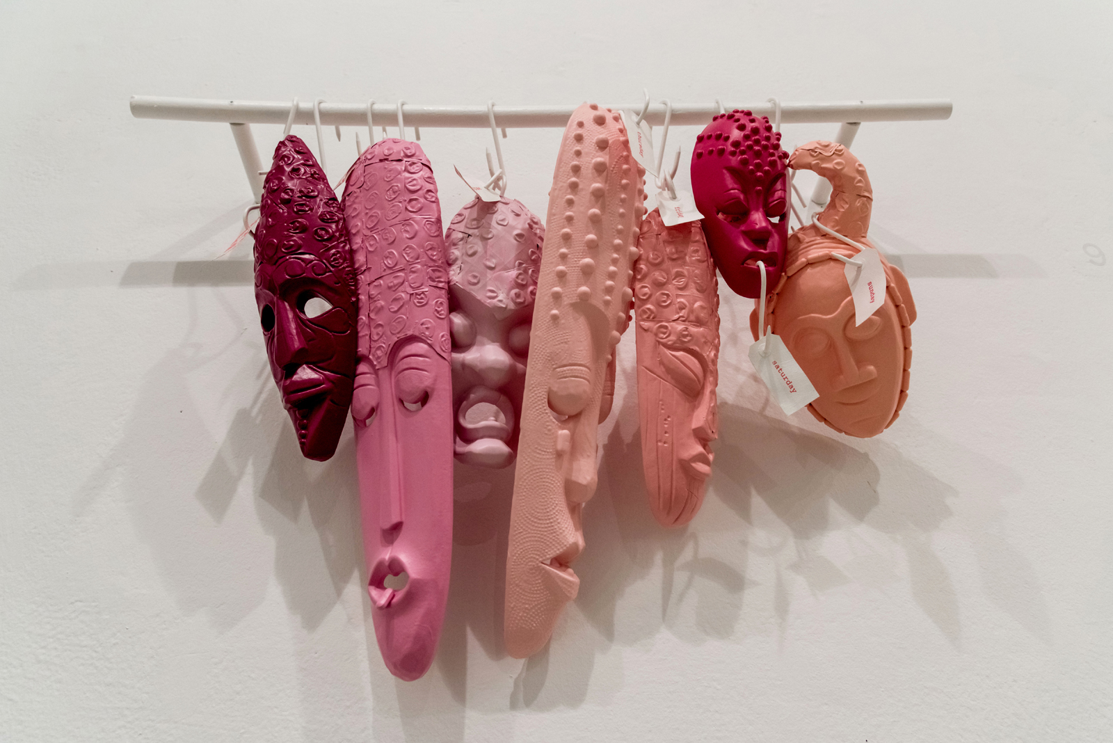ONE-A-DAY used pill blisters, metall, resin, laque & spray paint on wood, screen print & acrylics on paper, meat hooks 70 x 100 cm, 2018