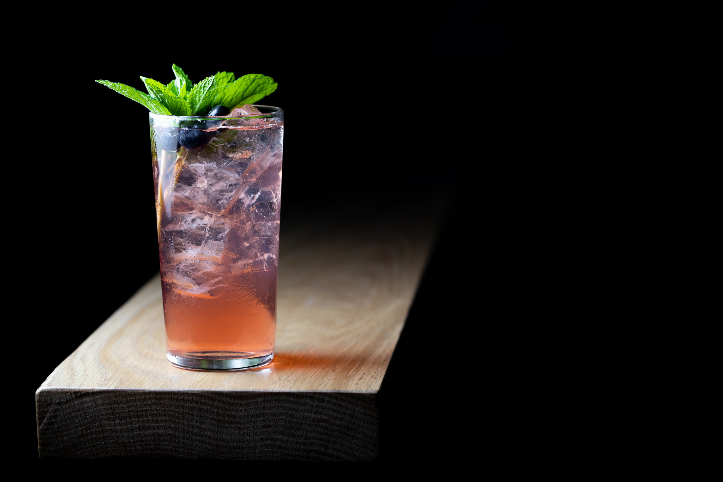 photo of a cocktail garnished with mint