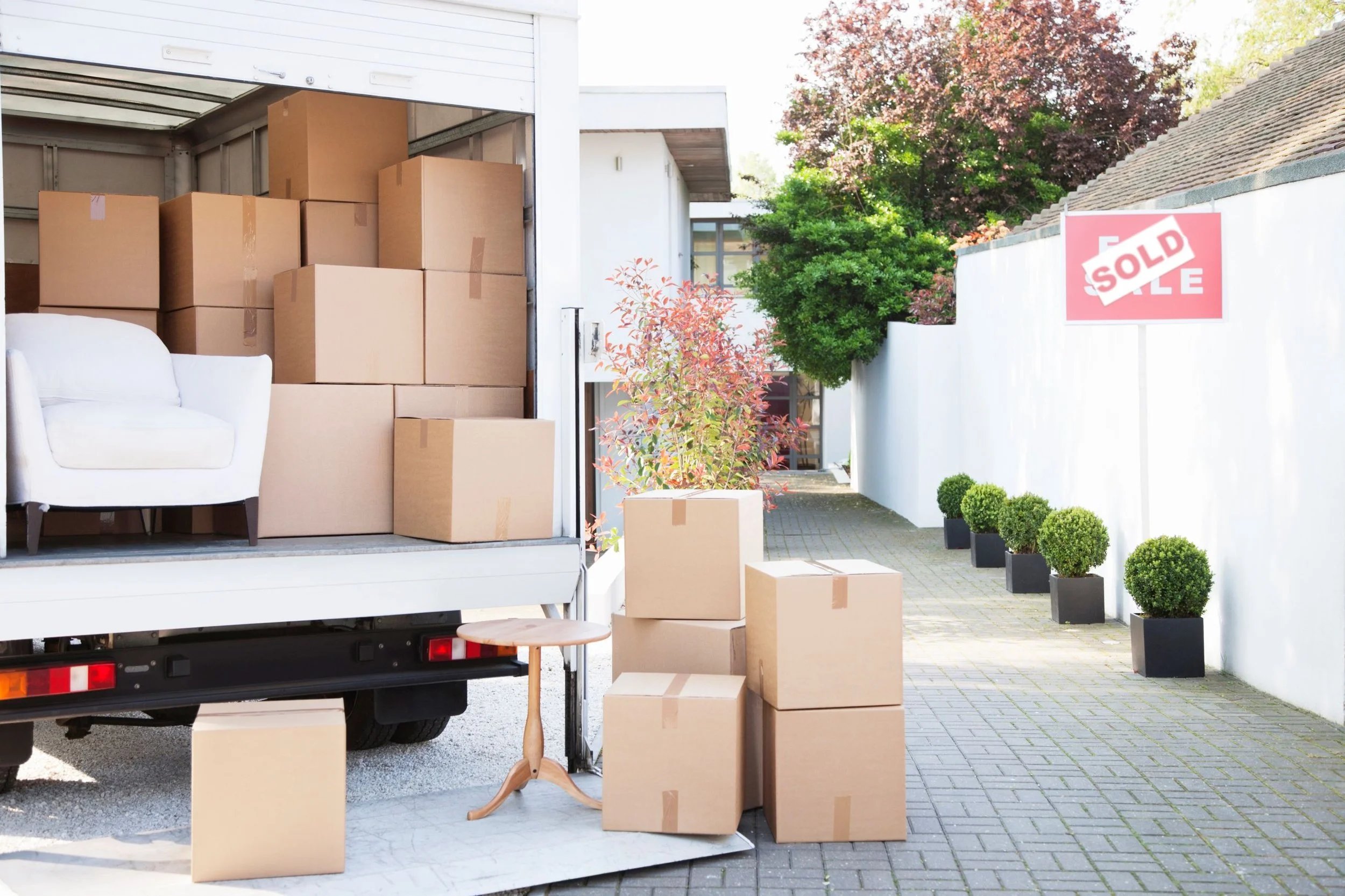Dallas moving truck loaded with packed boxes