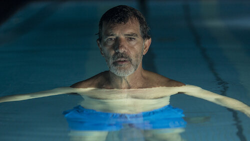 Salvador trying to drown out his physical pains and mental stresses by swimming.