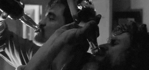 Alcohol is the means of knocking down any personal barricades the two main characters hold up.