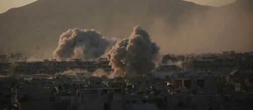 An explosion being recorded presumably by drone.