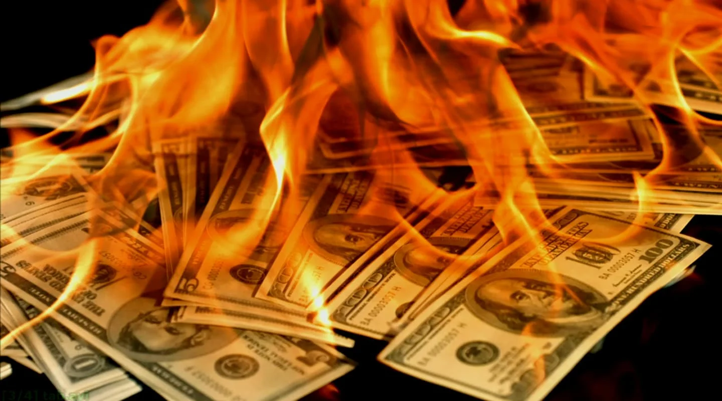 burn_money_pile.jpg