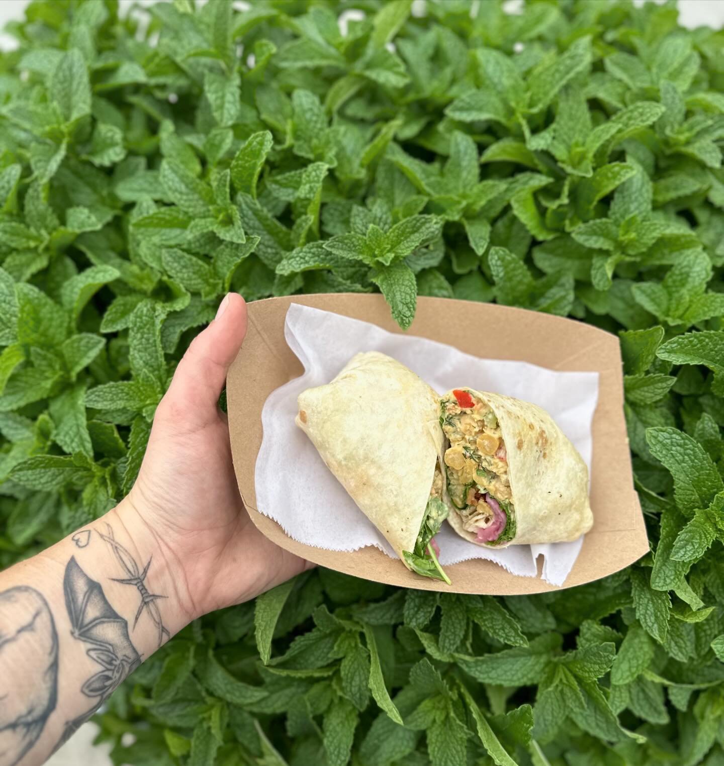 The Chickpea Salad Wrap is one of our fav lunch staples. A warm tortilla, stuffed with chickpea and lentil salad, arugula, pickled onions, and toasty walnuts!! This little guy can also be served in salad form if you&rsquo;re not interested in the tor