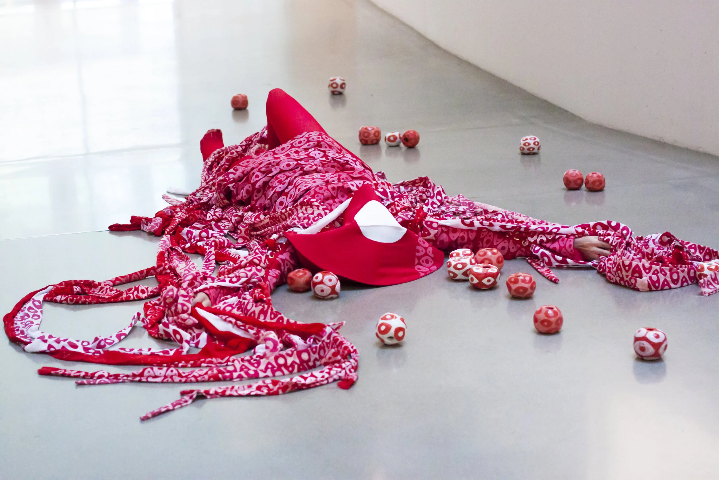   Eyes on Me,  2017. Performance. Glazed ceramic, silkscreened fabric, polyester, thread. 