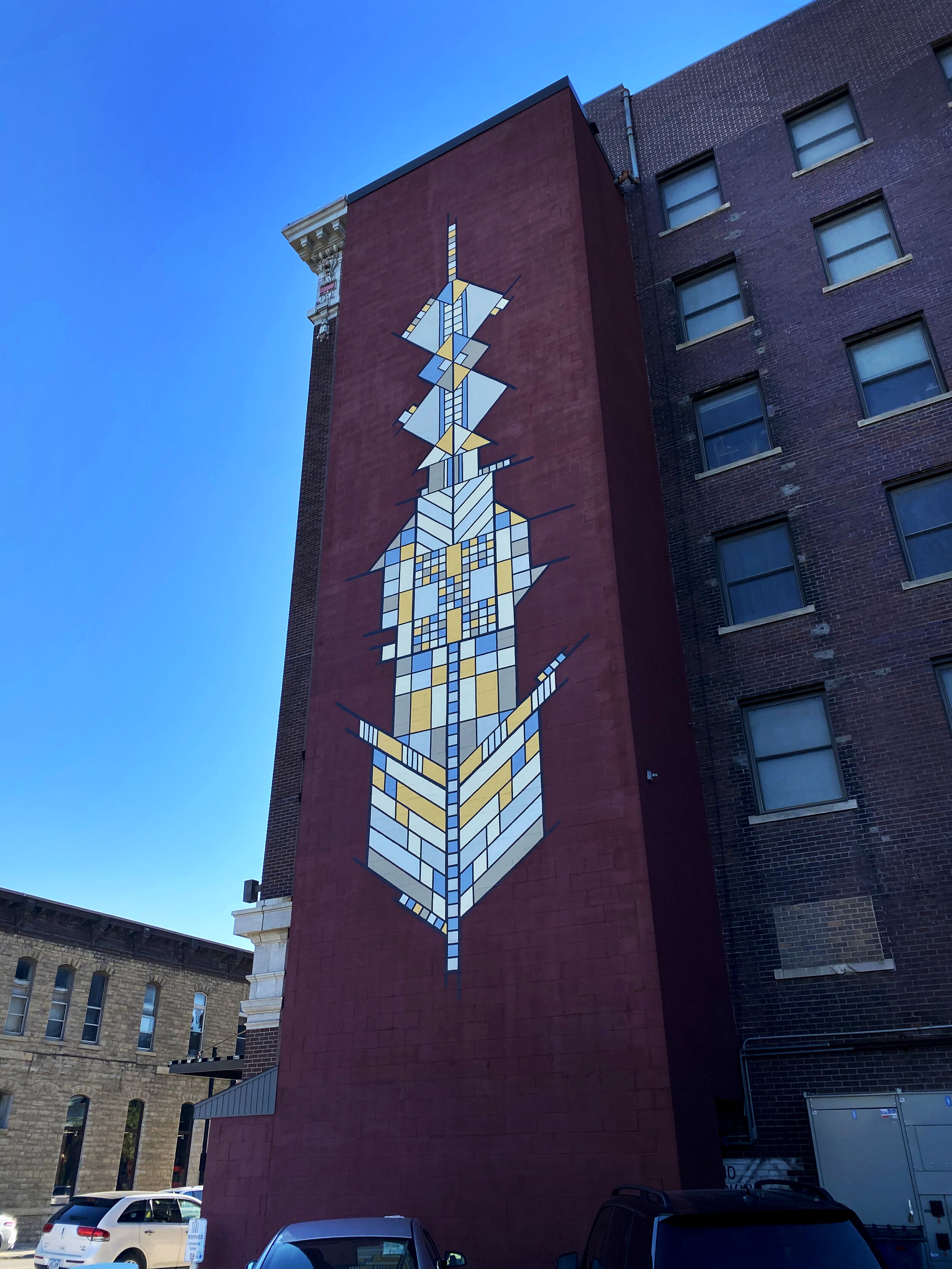   Stained-Glass Stairwell (Inspired by Frank Lloyd Wright) , Mason City, IA. 2018. Designed by Ali Hval, executed by Keeley Hertzel. 15'x60' 