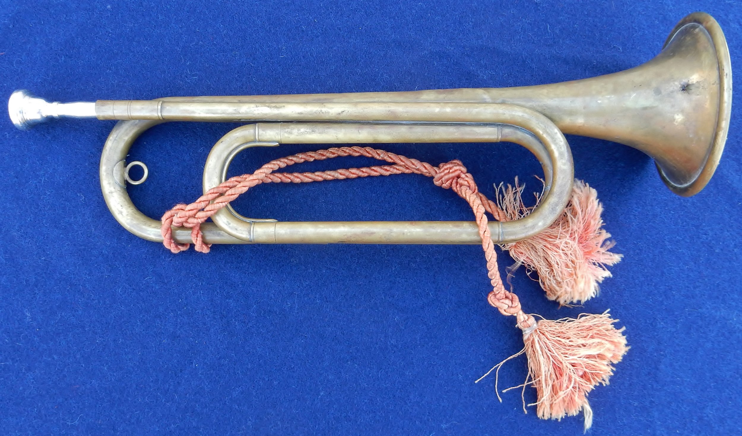 Bugle is bent on the other side and missing a second ring to attach the cord.
