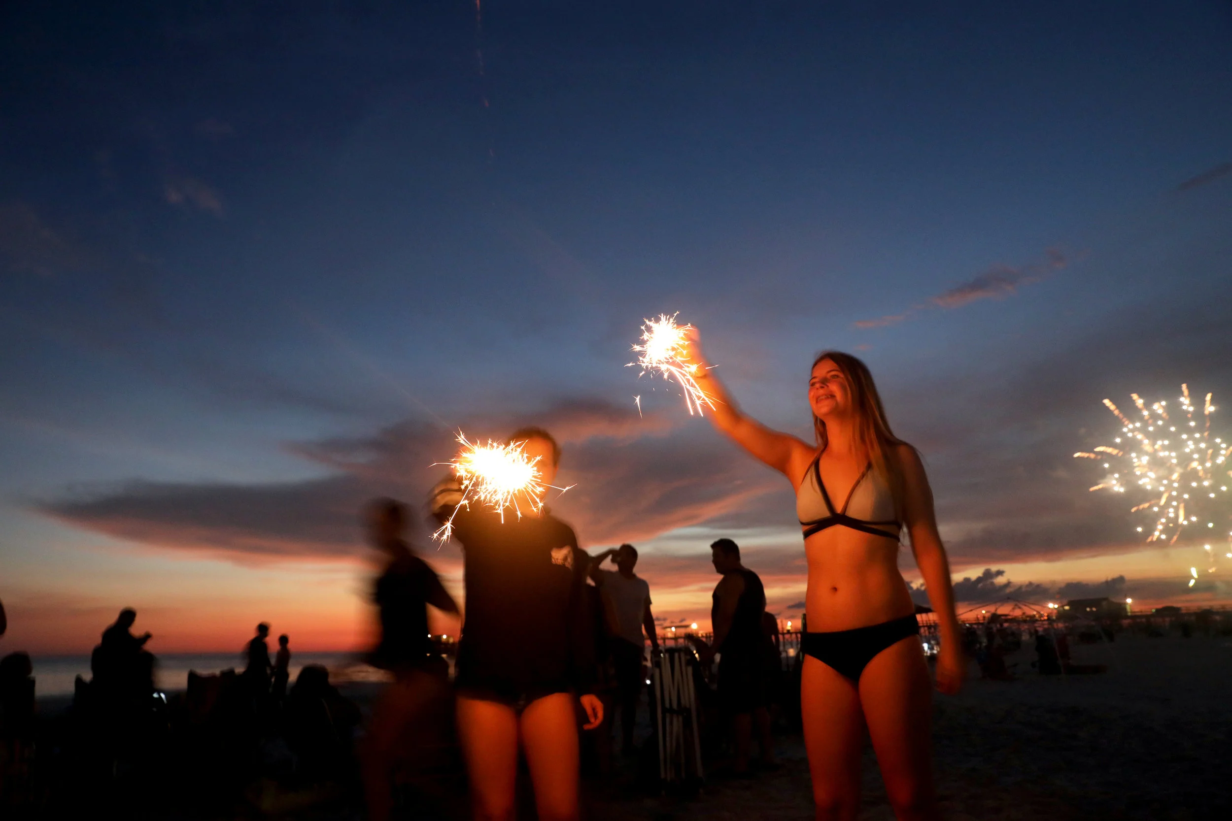  Friends enjoy the beach during 4th of July Celebrations. 