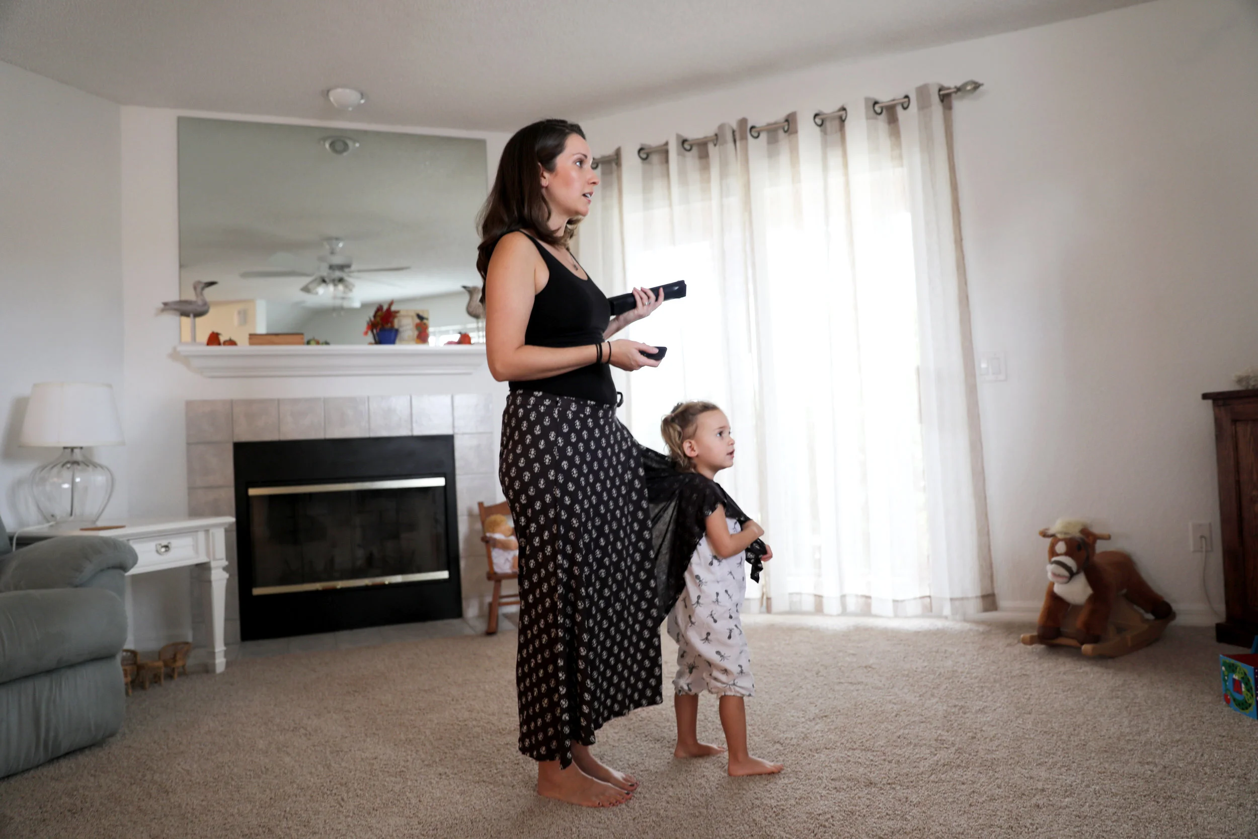   4 Supermoms Tell Us How They Balance Working from Home with Raising Kids  Amanda Boggs takes a break from work with her daughter, June.   