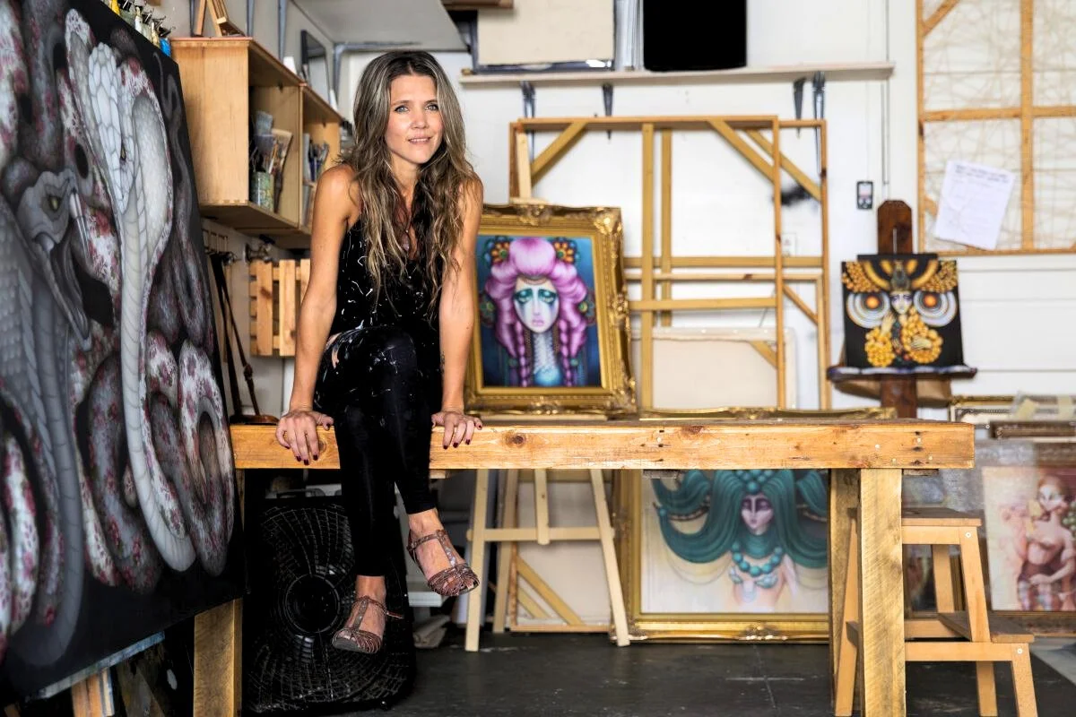    The Big Picture: How Two Muralists Make a Living With Their Art.      Bekky Beukes poses for a portrait inside her studio in St. Petersburg, Fla. Beukes was one of 17 local and visiting artists invited to participate in the annual SHINE Mural Fest