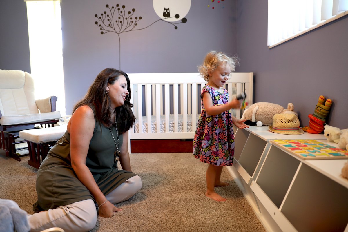  Colleen and her daughter, Marlow, play in her bedroom in St. Petersburg, Fla 