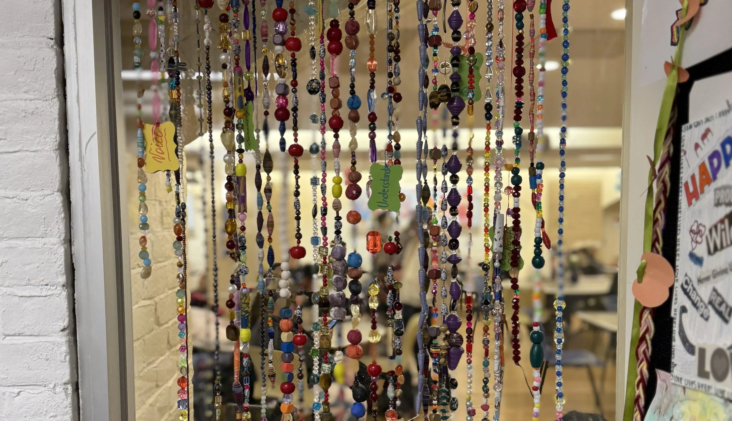 A beaded, hanging art project created by the guests of Women's Lunch Place.
