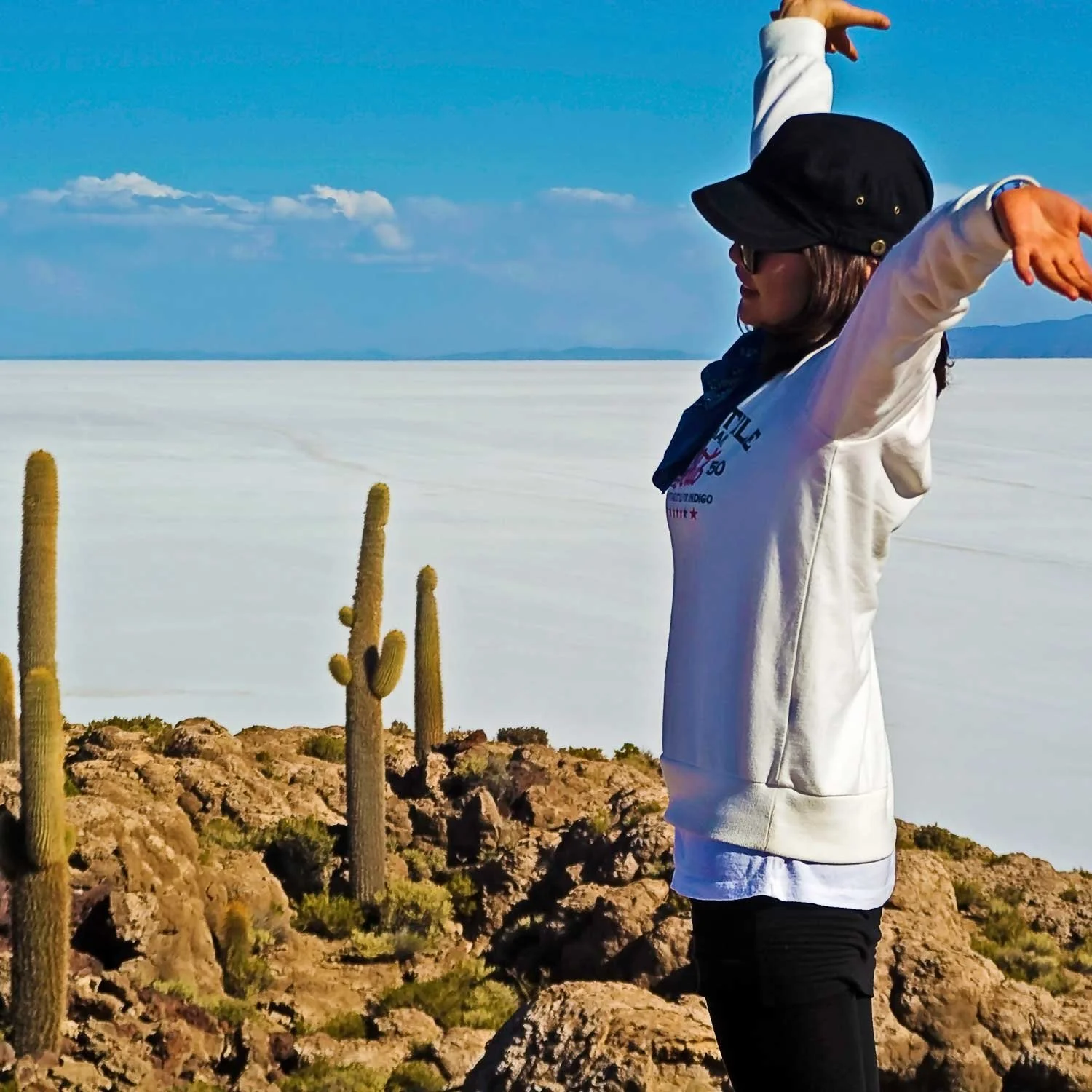 tourist-enjoying-the-view-on-cactus-island-salar-de-uyuni-bolivia.jpg