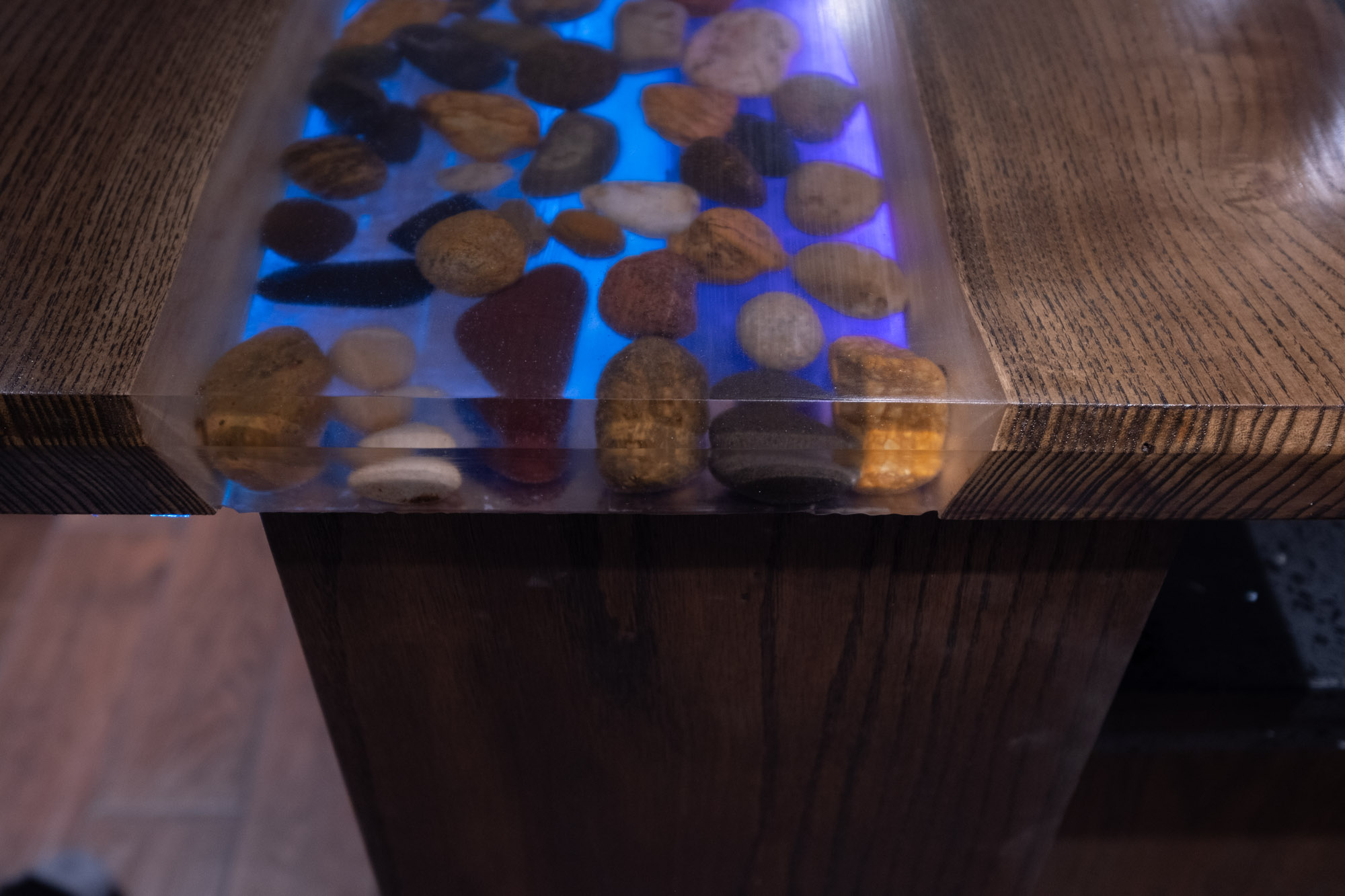 Custom epoxy bar top in basement renovation in Acton