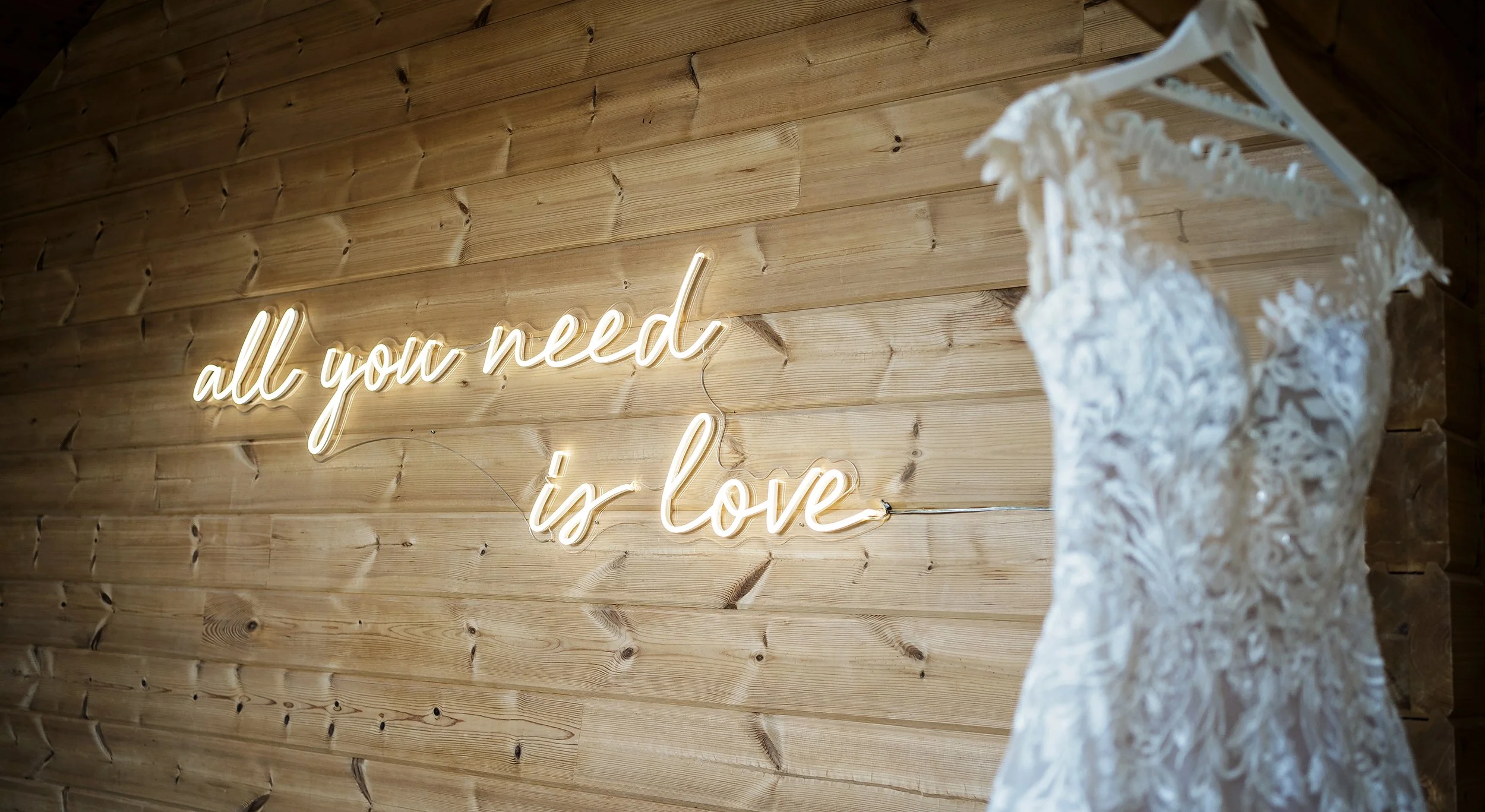 wedding dress hanging at styal lodge wedding venue