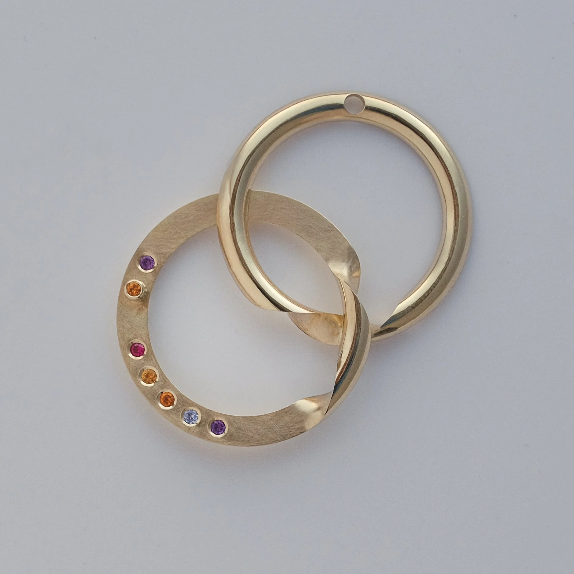 Gimmel ring made by hand in gold by goldsmith Julia Bocanet, made on commission with hidden gemstones.