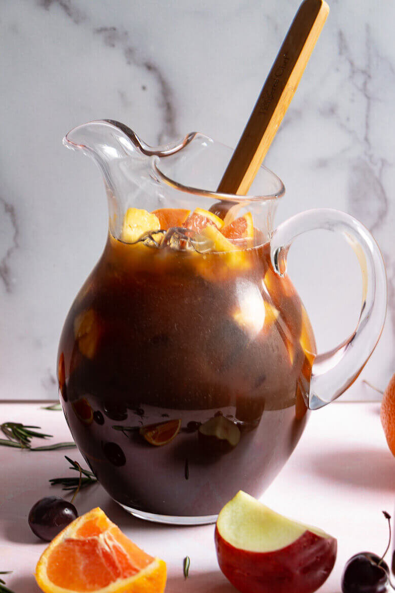 Prune Juice Pineapple Sangria with Rosemary Syrup