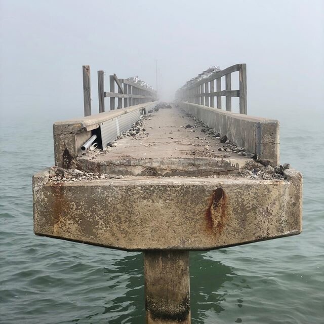 I took my girls to play at the park on the bay across the street from my parents&rsquo; house yesterday morning. We were greeted with an intense fog. This pier has been through a lot and after the last hurricane, became condemned. I read on a nearby 