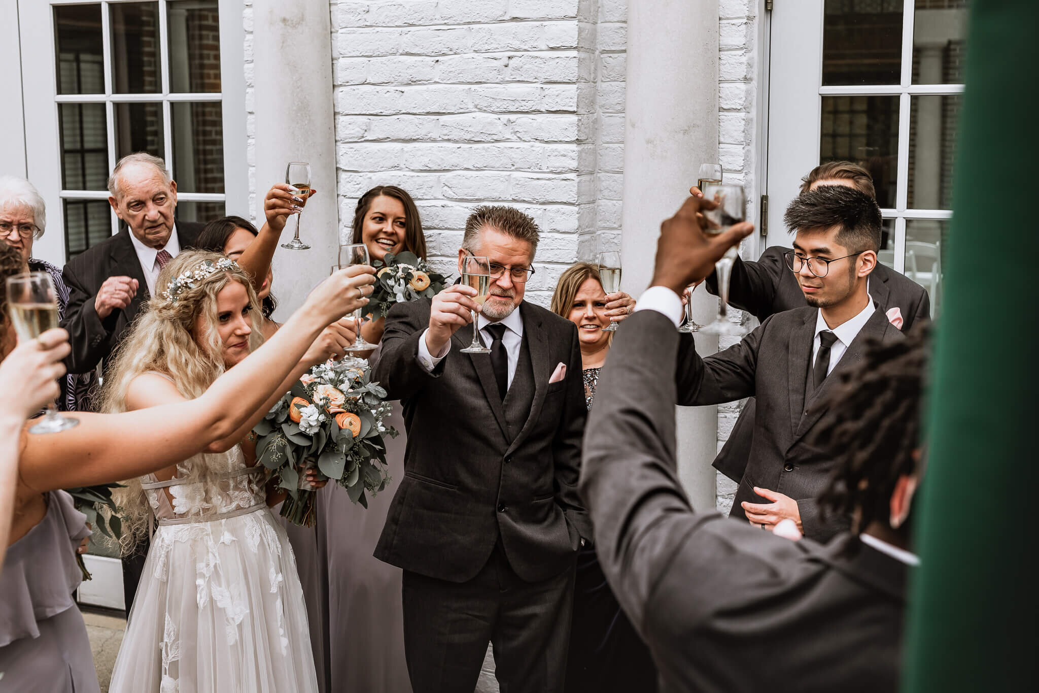 wedding-champagne-toast-manon-house.jpg