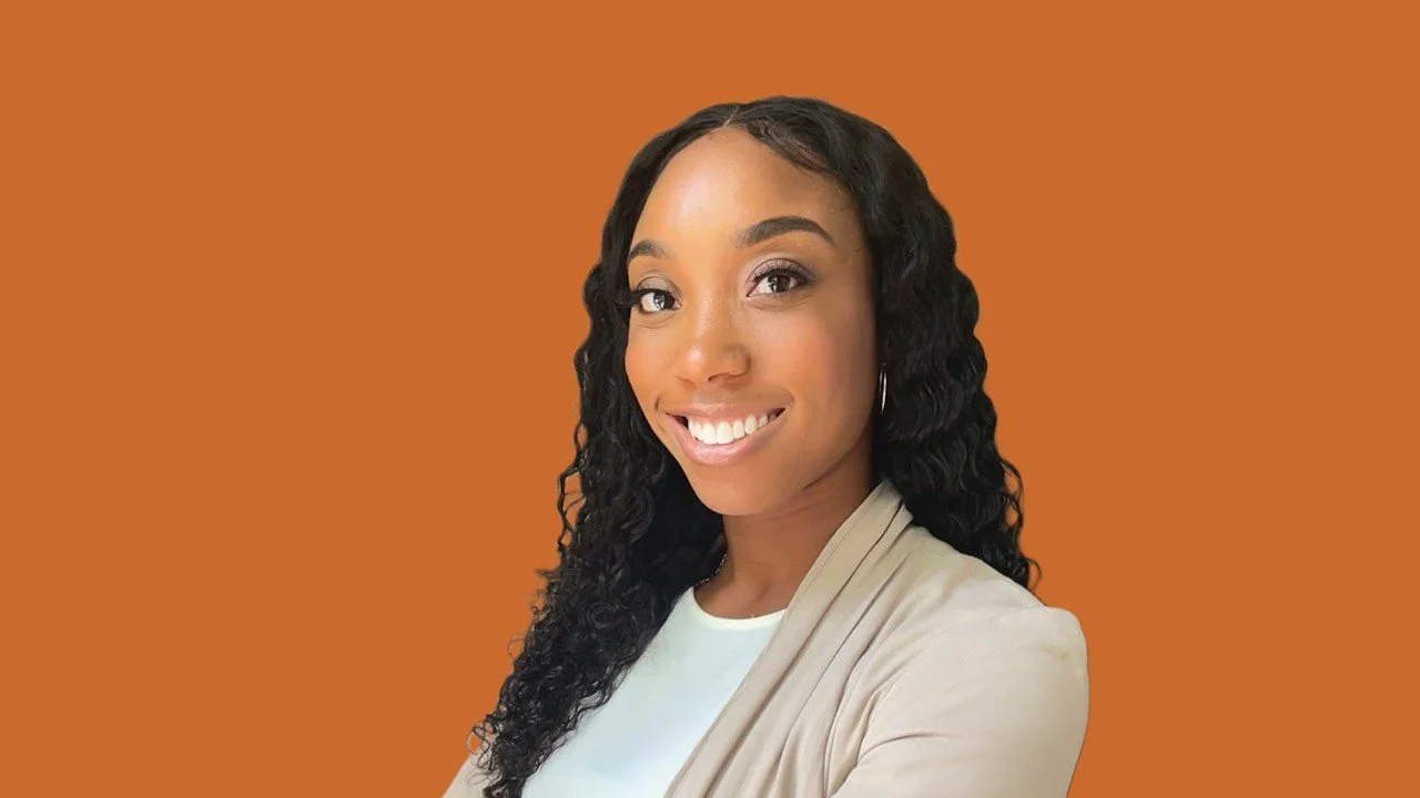 Dr. Cheria Morgan, sports chiropractor at Spine and Sport Bermuda, smiling in a professional headshot.