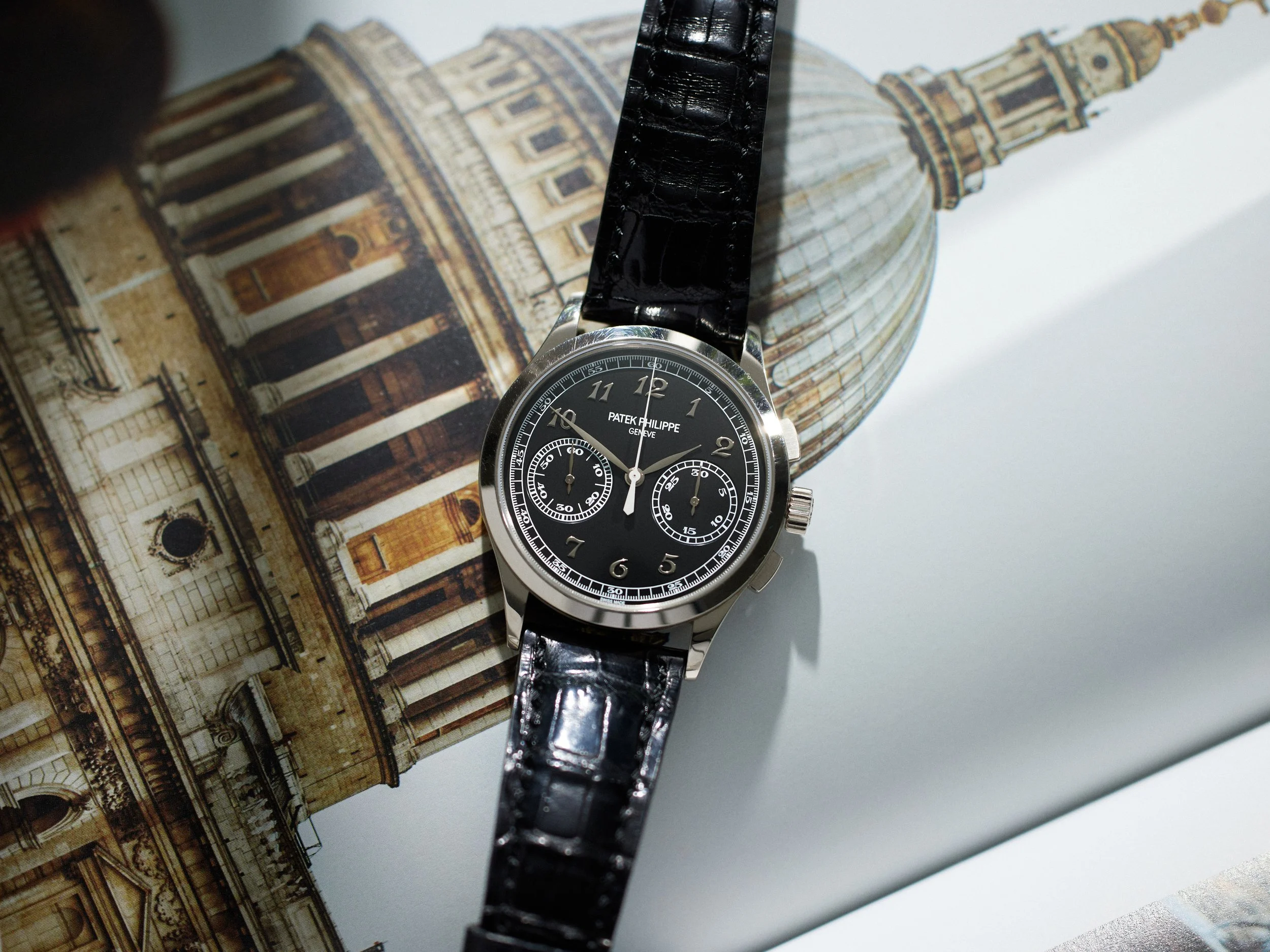 Front of the watch showing the dial, hands and case
