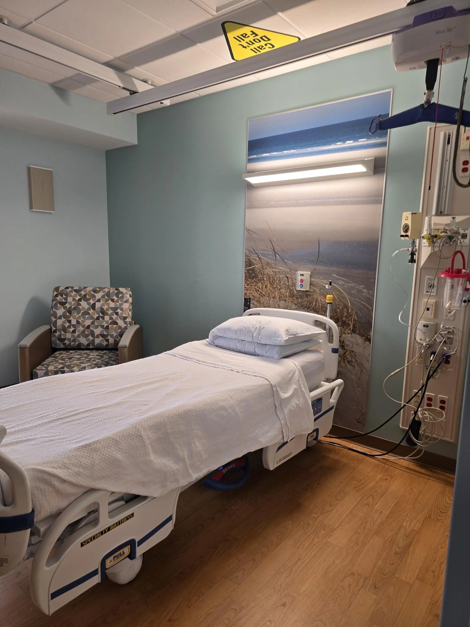 Patient Room Headwall graphics, upgraded lighting and added color on walls