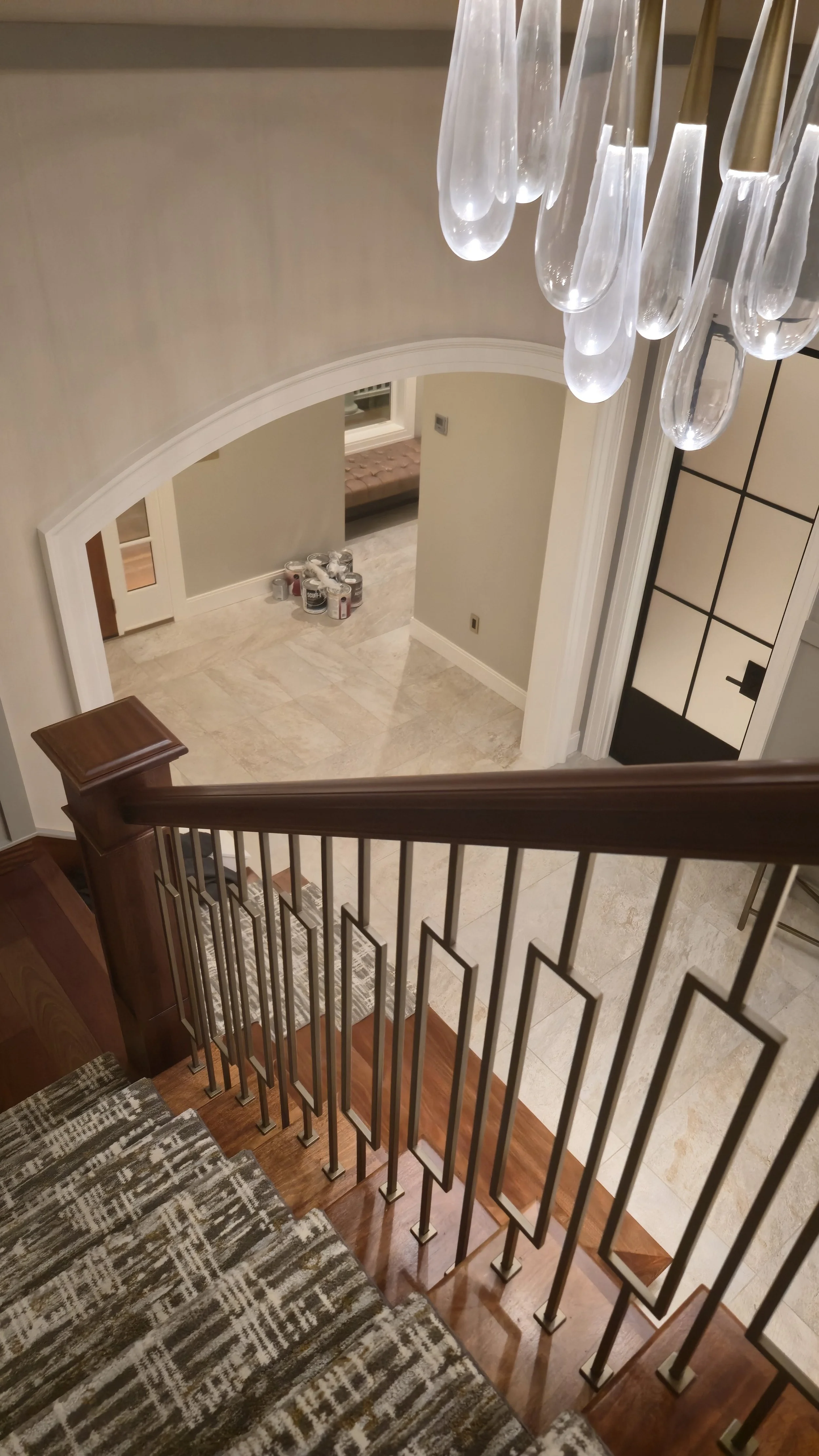 Replaced ballusters and stair runner