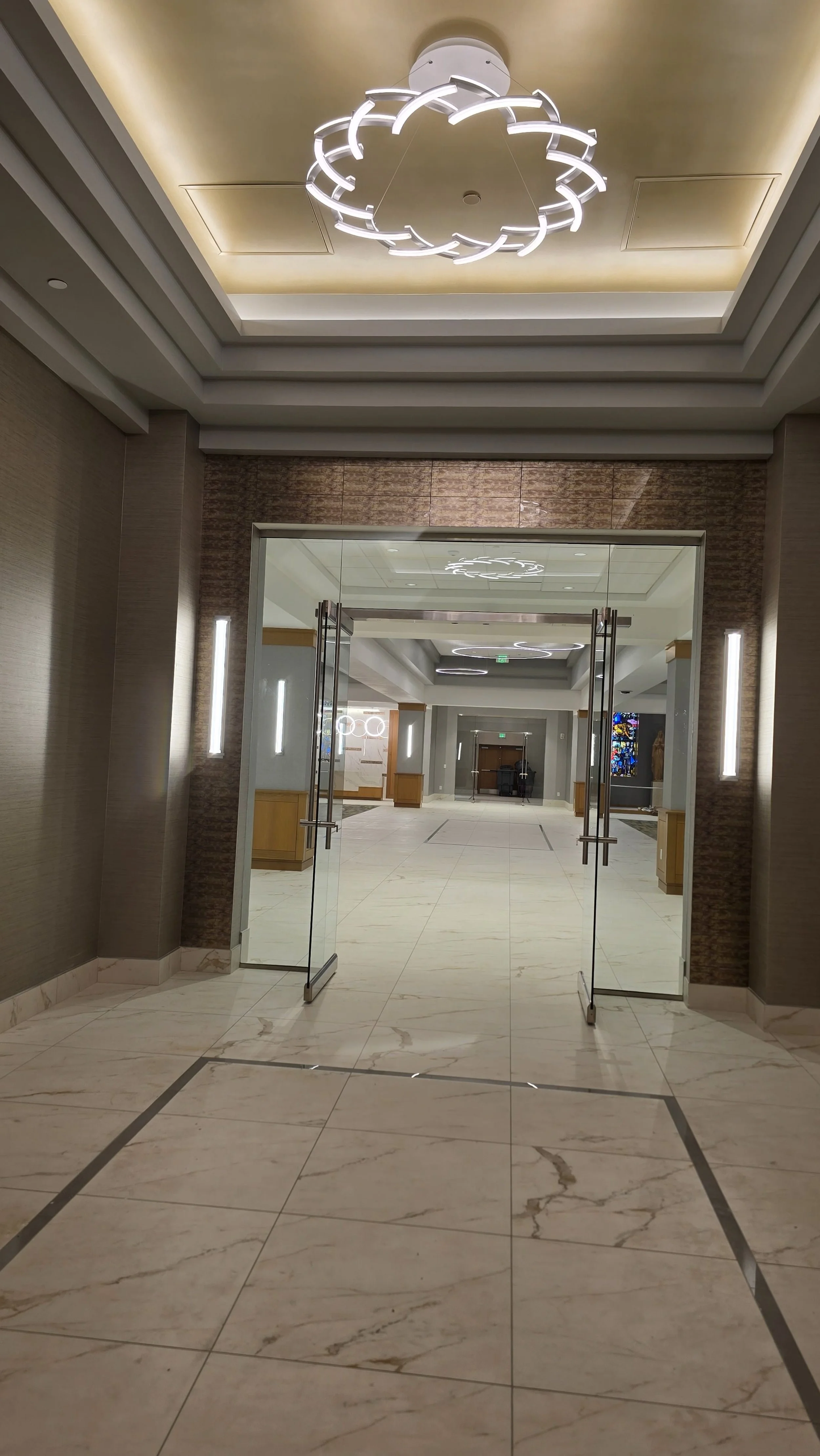 Metallic painted ceiling and statement pendants
